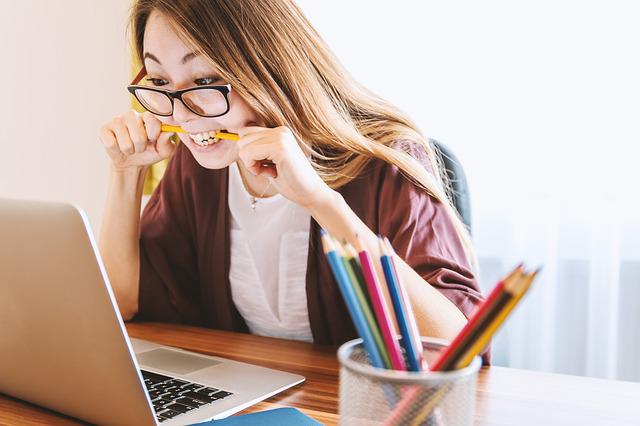 Girl looking at computer