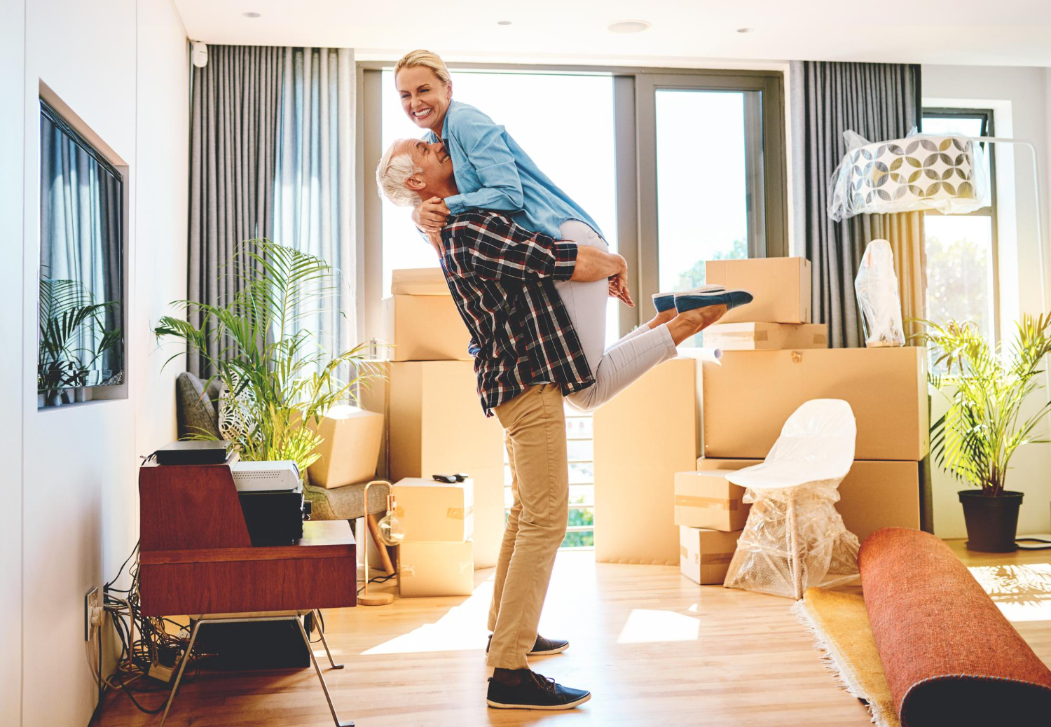 Couple moving into their new upsized home