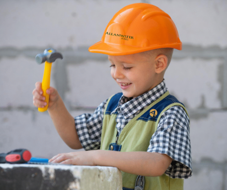 Young boy at work building